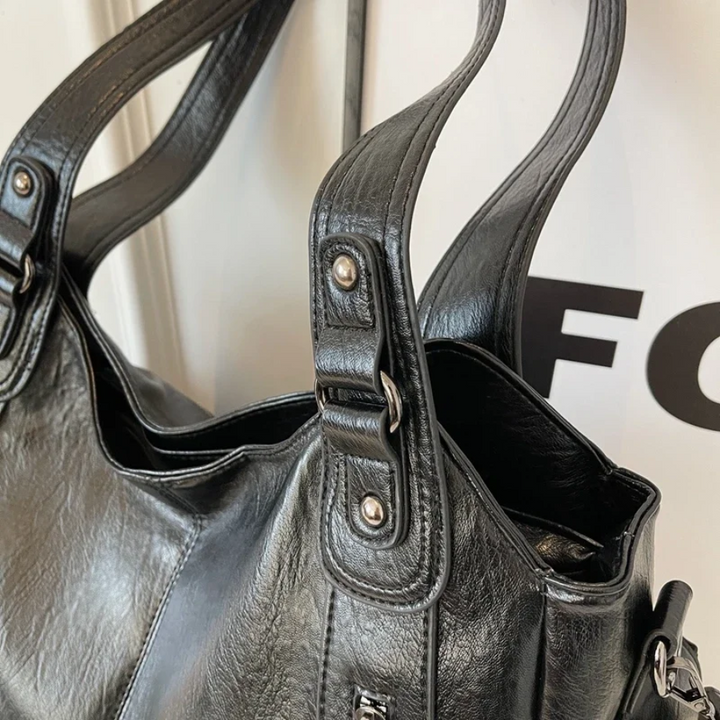 Spacious women's leather shoulder bag, autumn urban style