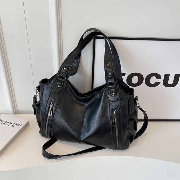 Spacious women's leather shoulder bag, autumn urban style