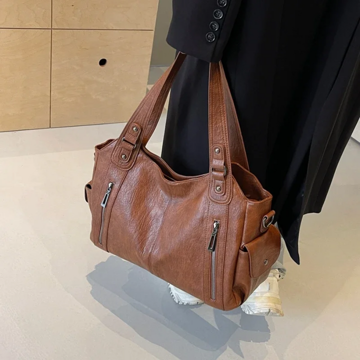 Spacious women's leather shoulder bag, autumn urban style