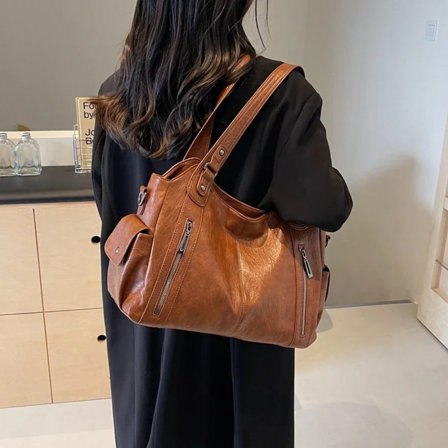 Spacious women's leather shoulder bag, autumn urban style