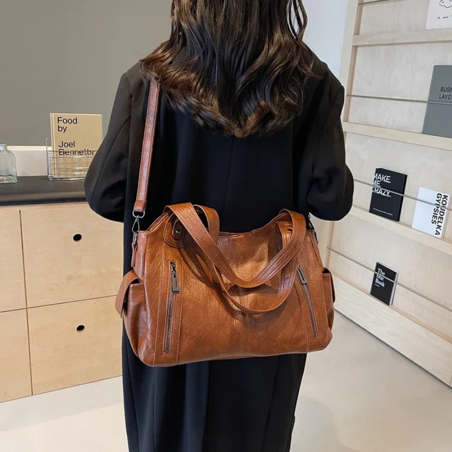 Spacious women's leather shoulder bag, autumn urban style