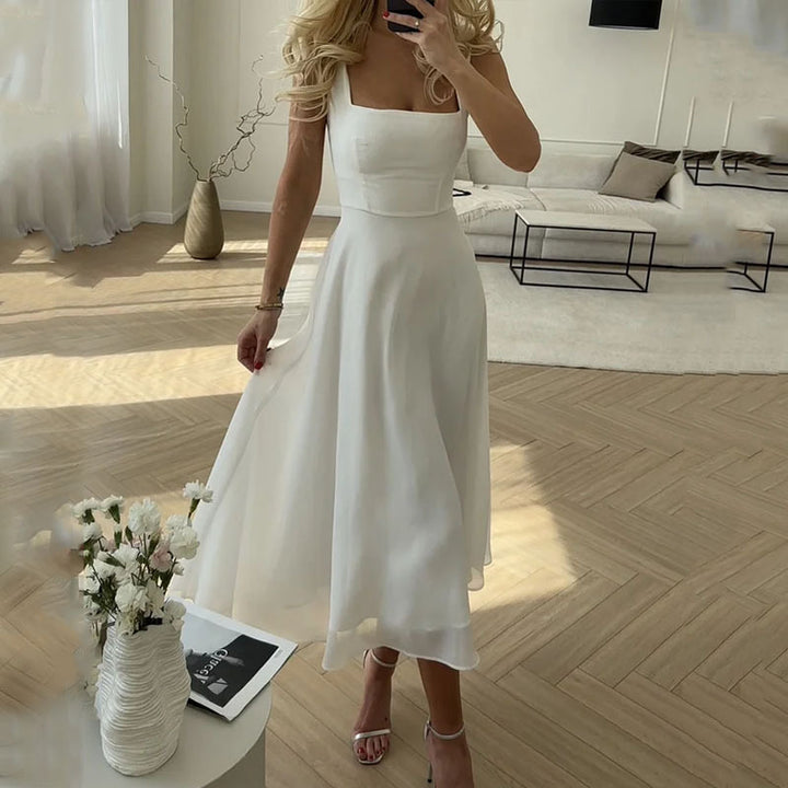 Bayla | Élégante robe de chambre midi sans manches pour femmes - jupe évasée fluide - look d'été chic