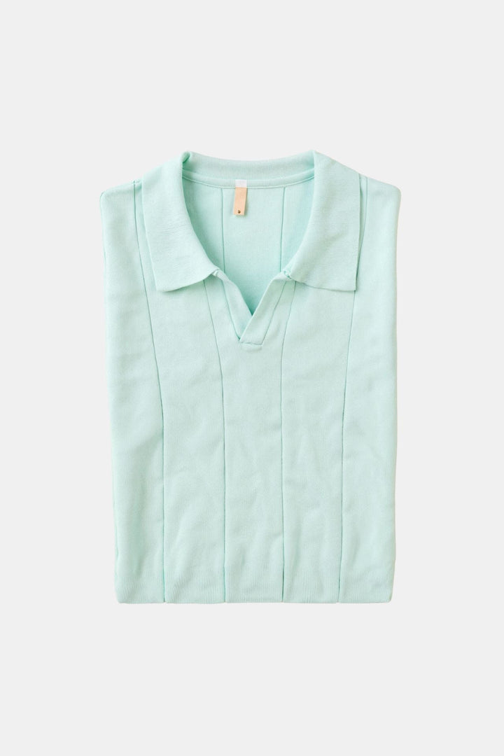 Polo en tricot rétro stylé dans un frais vert menthe