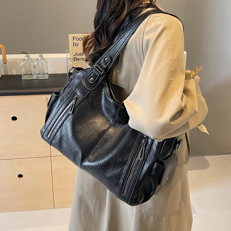 Spacious women's leather shoulder bag, autumn urban style