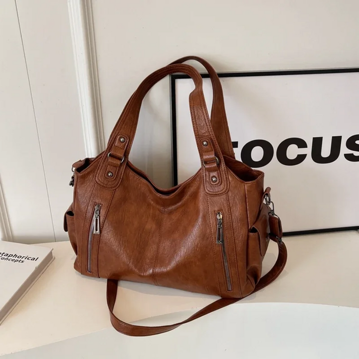 Spacious women's leather shoulder bag, autumn urban style