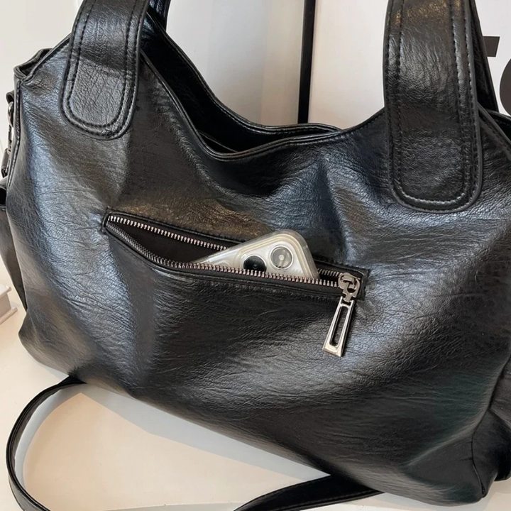 Spacious women's leather shoulder bag, autumn urban style