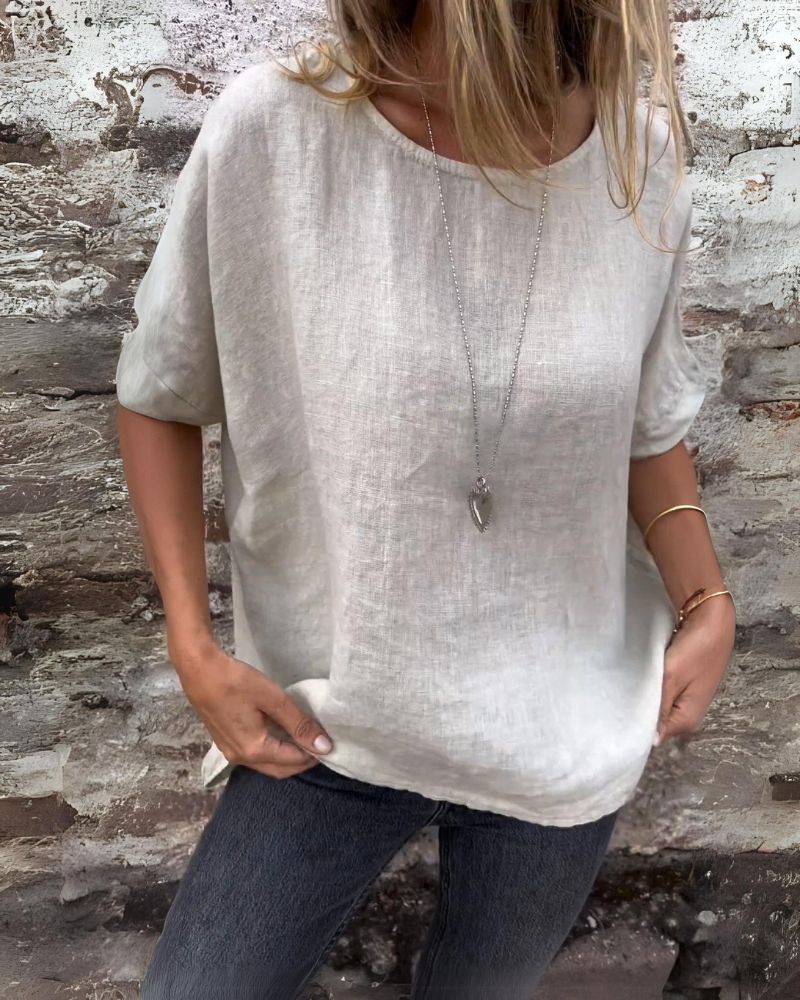 Urielle - Elegant women's top with short sleeves and a round neckline for a comfortable style.