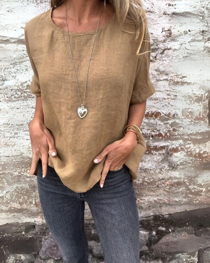 Urielle - Elegant women's top with short sleeves and a round neckline for a comfortable style.