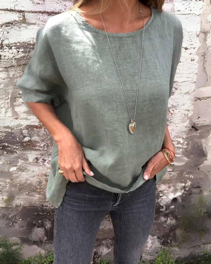 Urielle - Elegant women's top with short sleeves and a round neckline for a comfortable style.