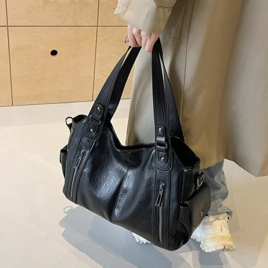 Spacious women's leather shoulder bag, autumn urban style