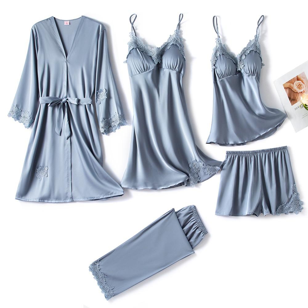 https://cdn.shopify.com/s/files/1/0998/9200/3147/files/5-piece-satin-sleep-set-for-women-with-lace-amara-light-blue-xs-state_of_style-8.jpg?v=1766840532