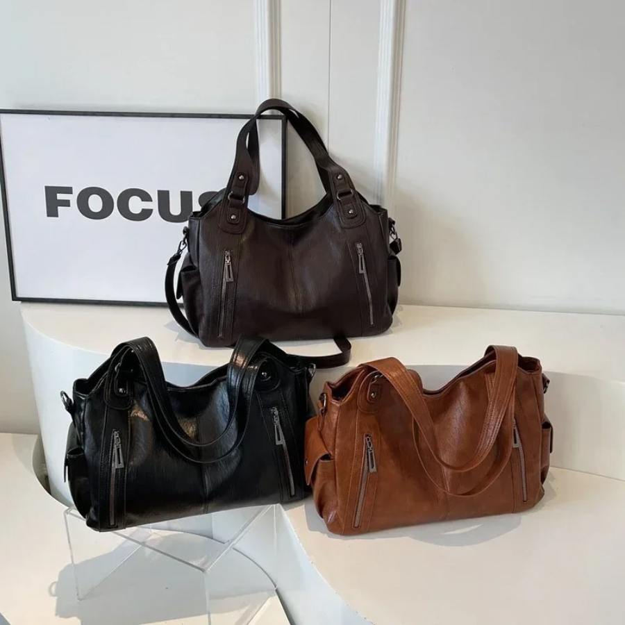 Spacious women's leather shoulder bag, autumn urban style