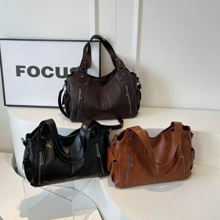 Spacious women's leather shoulder bag, autumn urban style