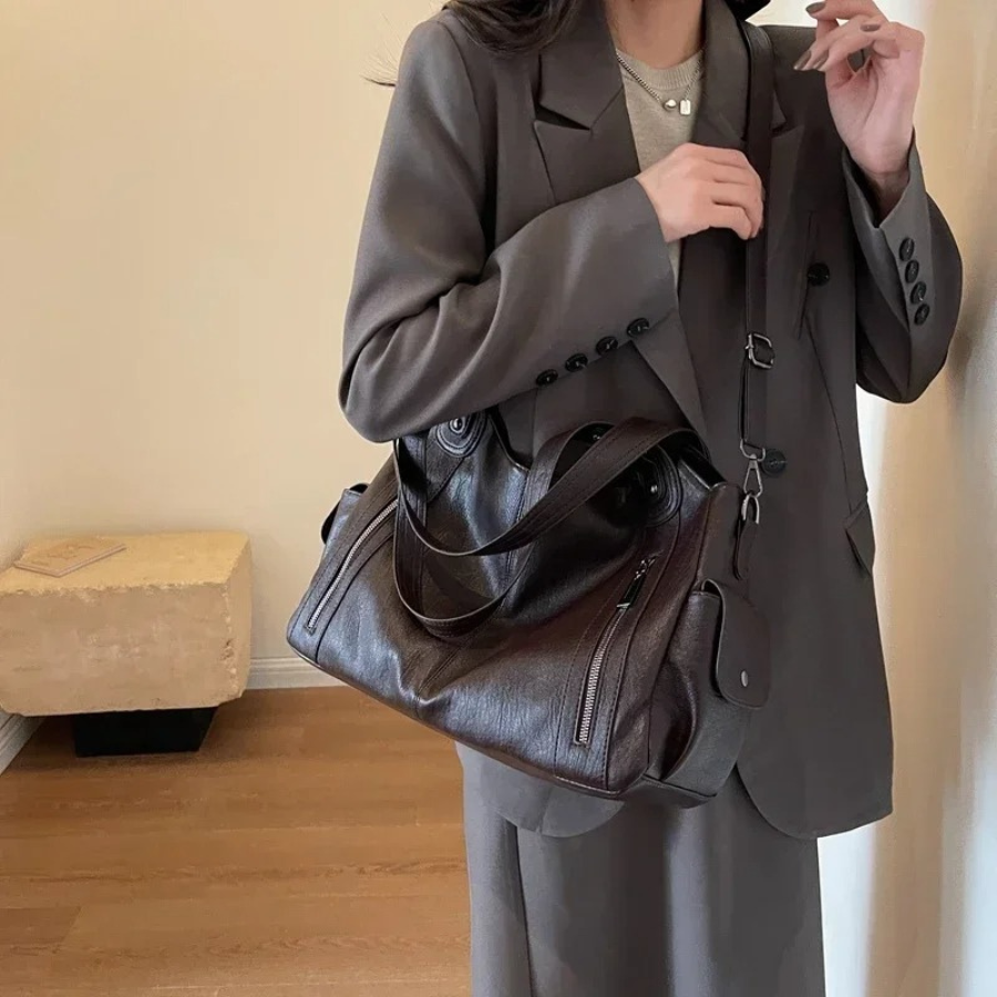 Spacious women's leather shoulder bag, autumn urban style