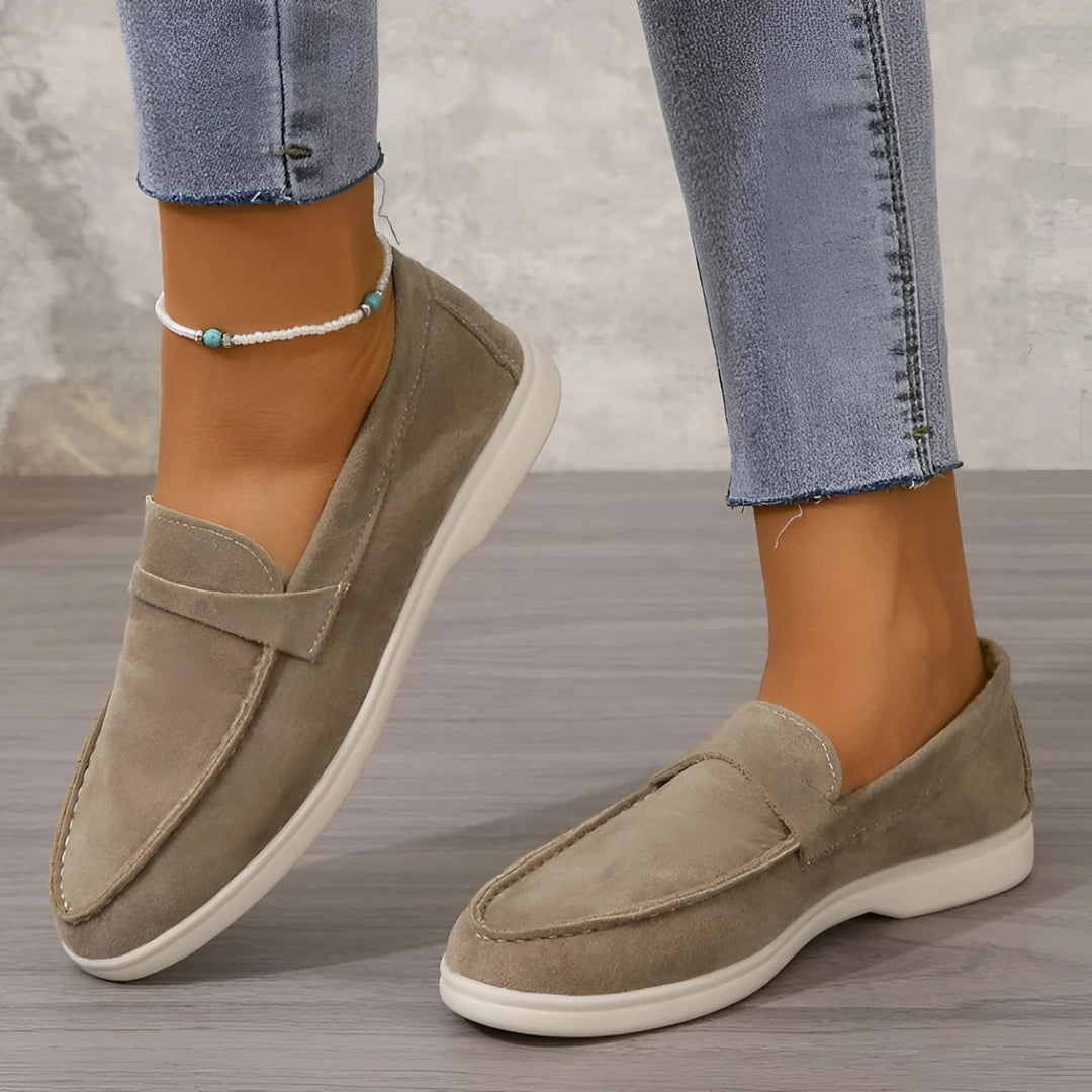https://cdn.shopify.com/s/files/1/0998/9200/3147/files/Avencea_beige_women_s_suede_slip_on_lo_01718511.jpg?v=1766839675