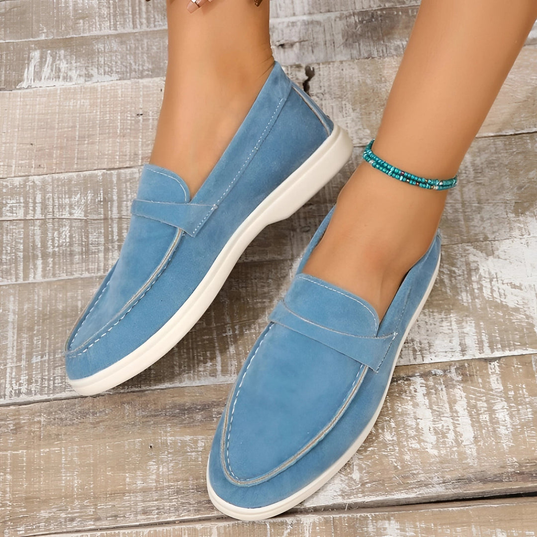 https://cdn.shopify.com/s/files/1/0998/9200/3147/files/Avencea_beige_women_s_suede_slip_on_lo_37373312.jpg?v=1766839675