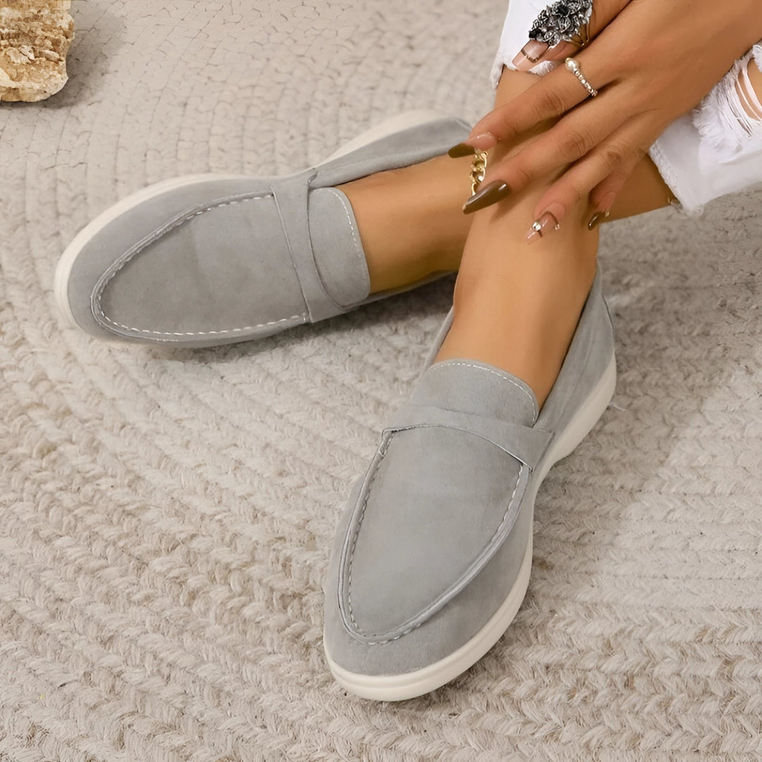 https://cdn.shopify.com/s/files/1/0998/9200/3147/files/Avencea_beige_women_s_suede_slip_on_lo_74808743.jpg?v=1766839675