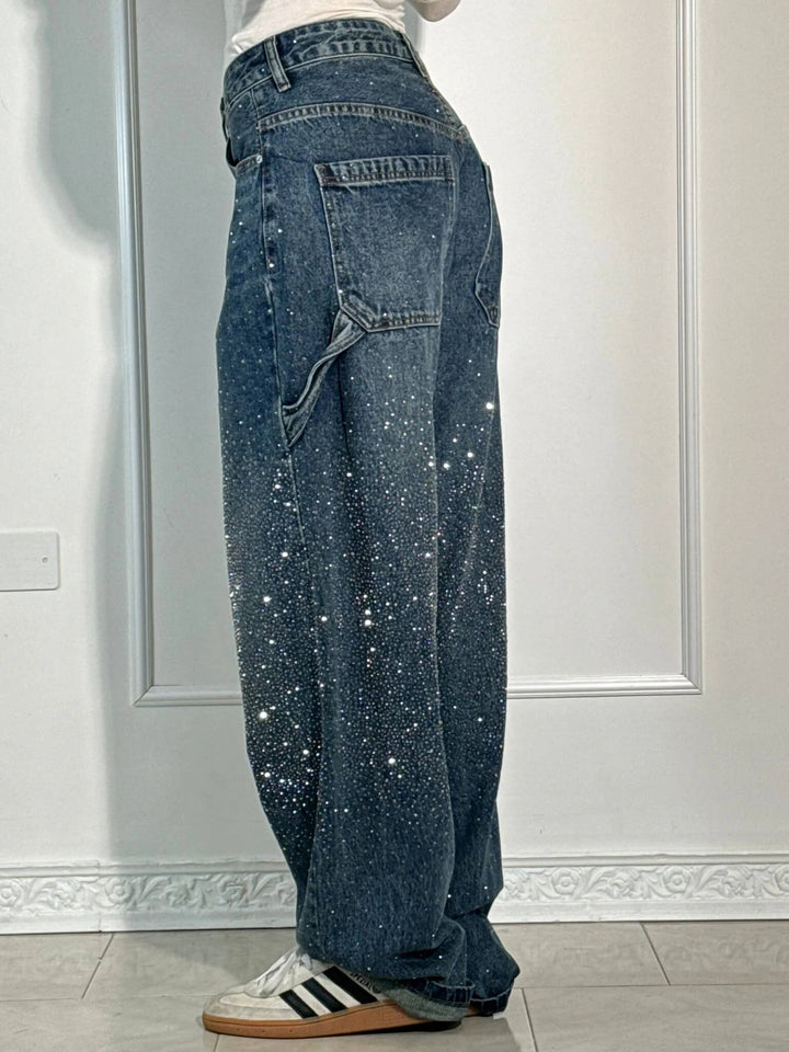 https://cdn.shopify.com/s/files/1/0998/9200/3147/files/Balloon_carpenter_shiny_denim_jeans_2.jpg?v=1766665912