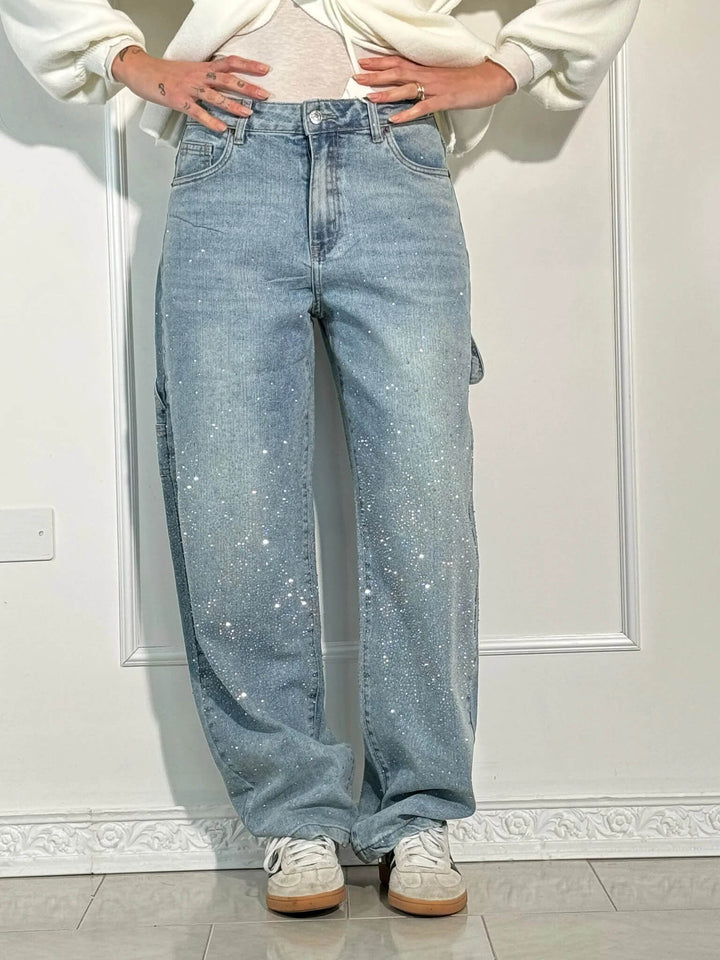 https://cdn.shopify.com/s/files/1/0998/9200/3147/files/Balloon_carpenter_shiny_denim_jeans_4.jpg?v=1766665913