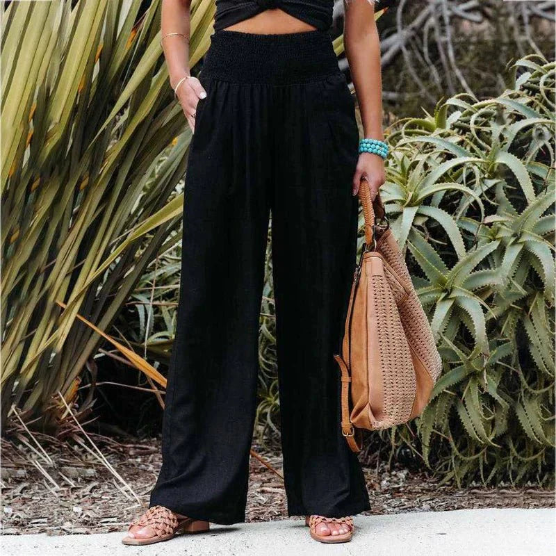 Pantalon d'été léger et confortable avec taille froncé pour un look décontracté.
