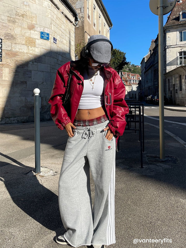 Jazzlyn - Pantalon de jogging grise chic avec une luxueuse ceinture double pour confort et style.