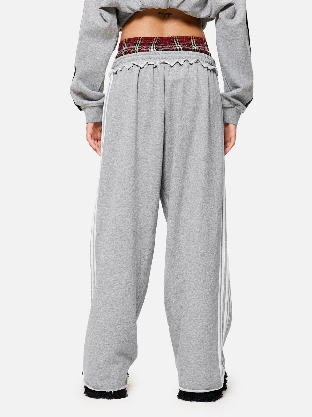 Jazzlyn - Pantalon de jogging grise chic avec une luxueuse ceinture double pour confort et style.