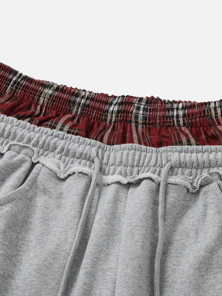 Jazzlyn - Pantalon de jogging grise chic avec une luxueuse ceinture double pour confort et style.