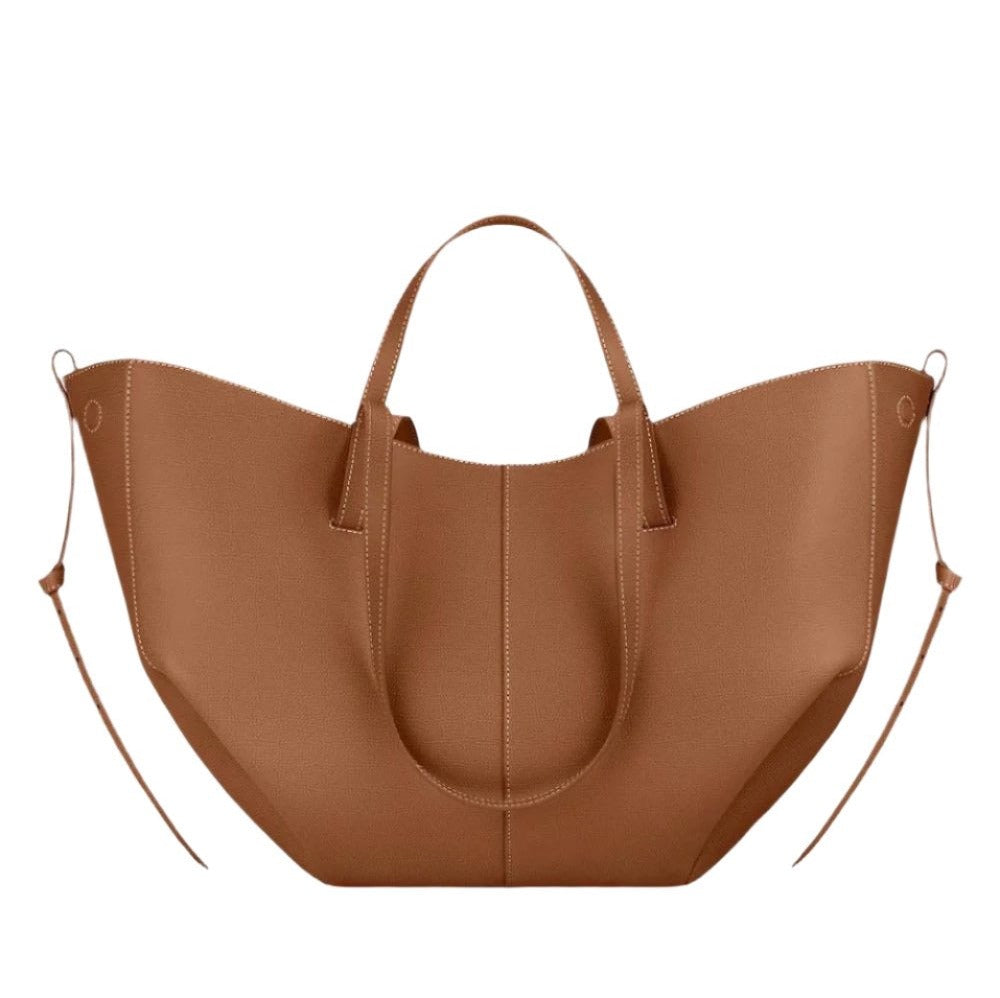 Spacious women's leather tote bag for laptop, ideal for autumn and work