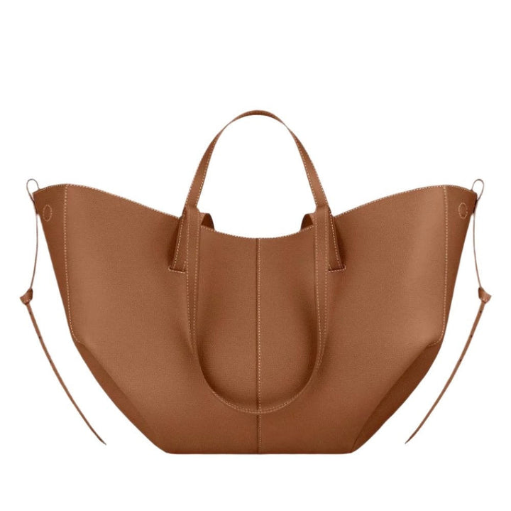 Spacious women's leather tote bag for laptop, ideal for autumn and work