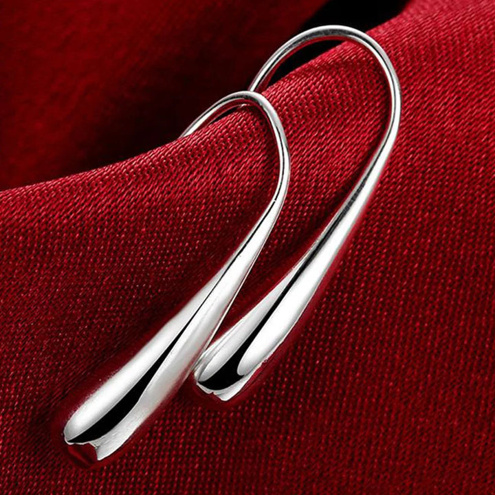 925 silver drop-shaped hoop earrings with an autumnal design