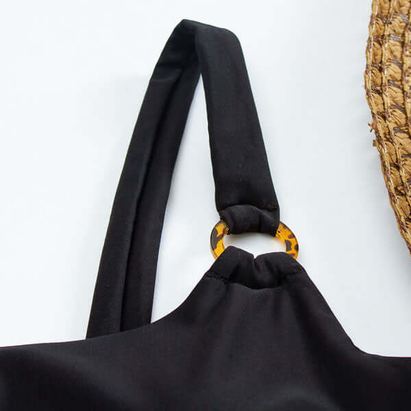 https://cdn.shopify.com/s/files/1/0998/9200/3147/files/Straight_Neck_Swimsuit_with_Open_Front_and_Decorative_Rings_8.jpg?v=1766840934