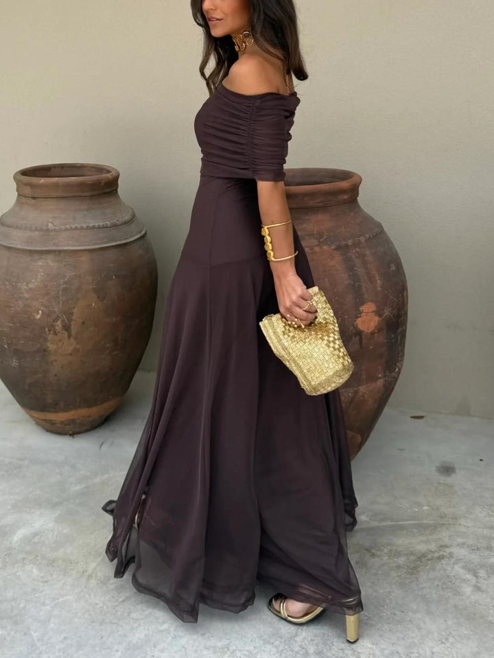 https://cdn.shopify.com/s/files/1/0998/9200/3147/files/Toledo_One_Shoulder_Mesh_Maxi_Dress_1.jpg?v=1766661062