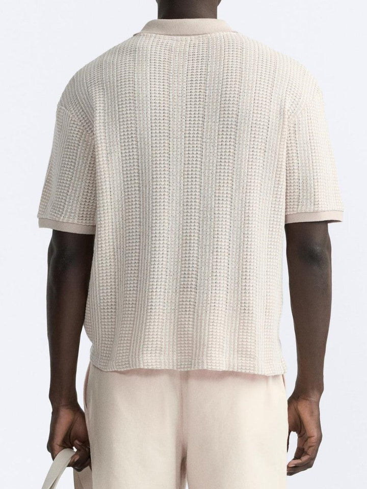 Polo tricotée élégante avec fermeture éclair pour un look chic