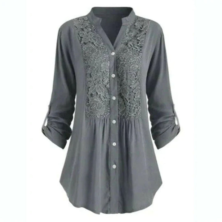 Elegant Heather Embroidered Fabric Blouse with Long Sleeves and Button Closure for Women.