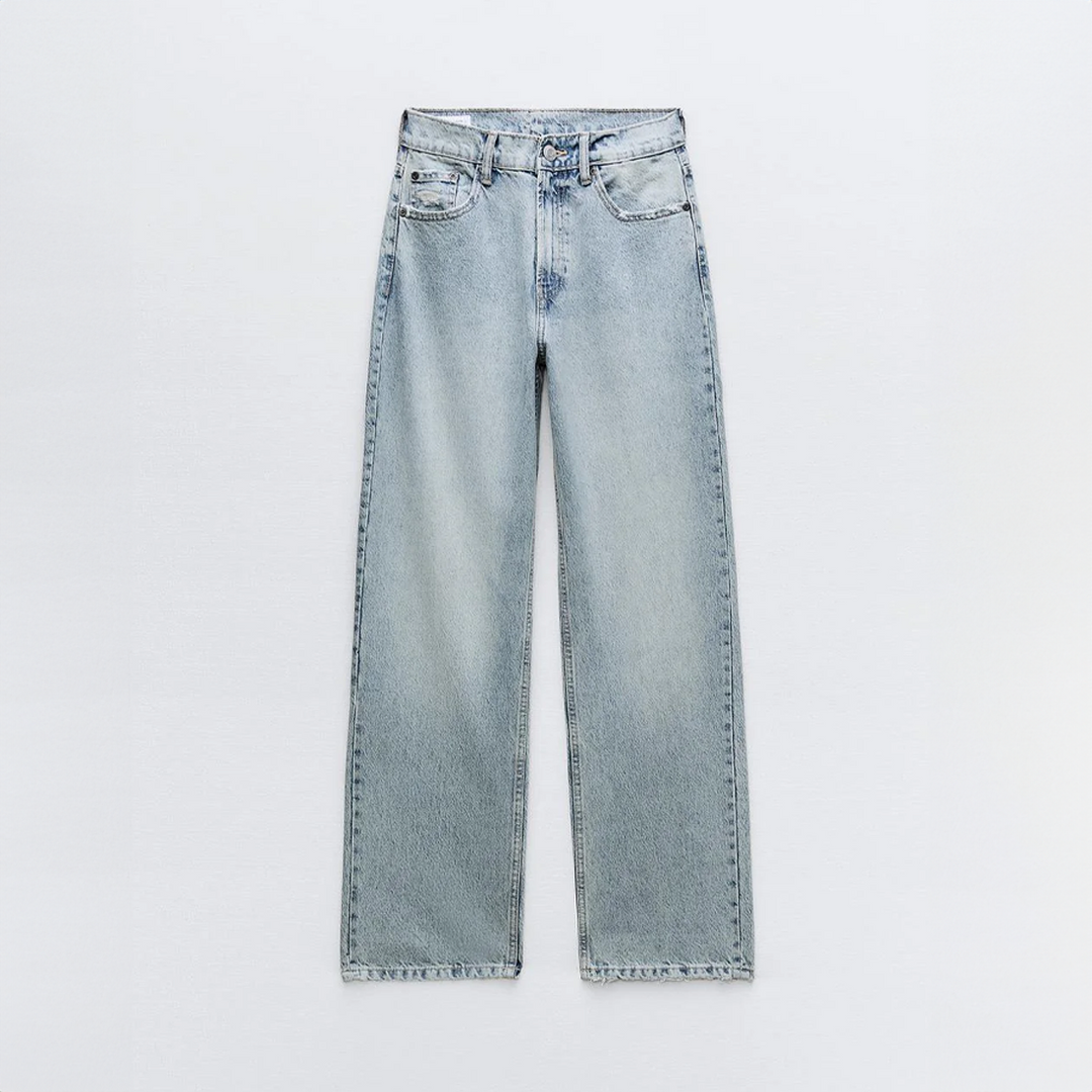 Jean vintage déchiré stylé avec un design patchwork unique