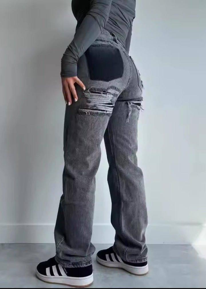 Jean vintage déchiré stylé avec un design patchwork unique