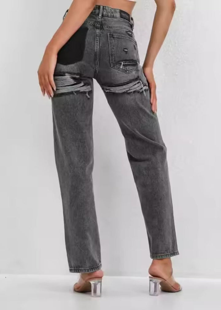 Jean vintage déchiré stylé avec un design patchwork unique