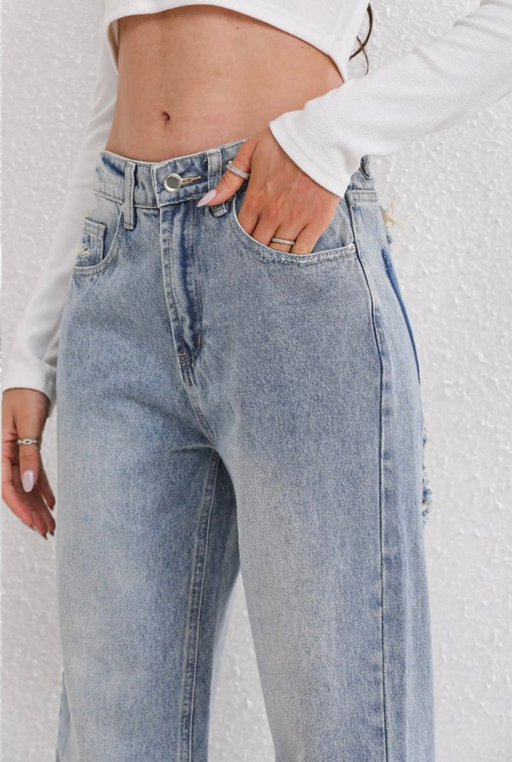 Jean vintage déchiré stylé avec un design patchwork unique