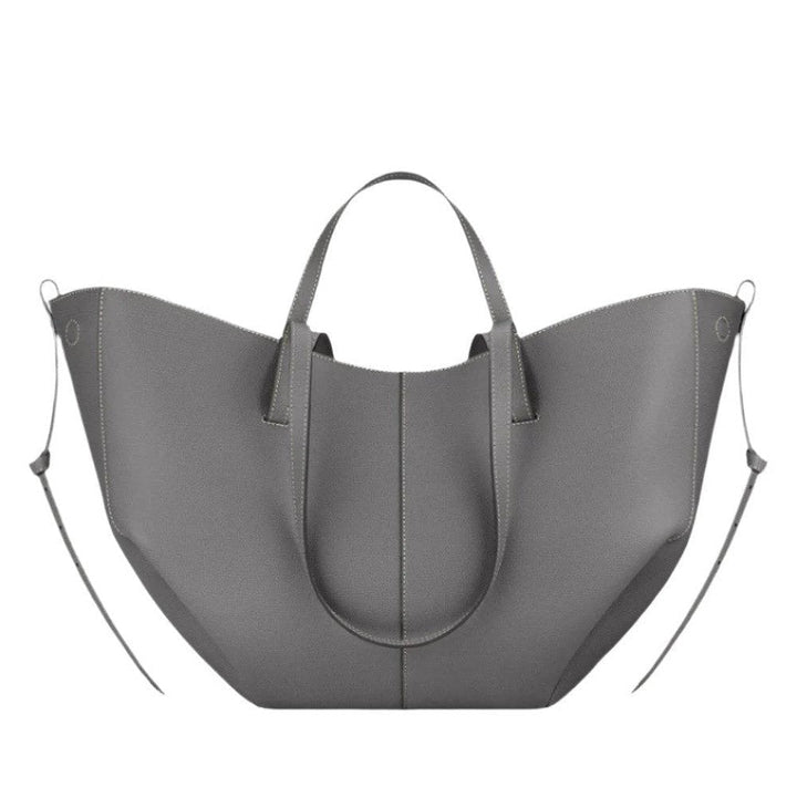 Spacious women's leather tote bag for laptop, ideal for autumn and work