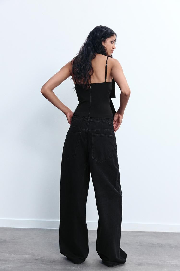 https://cdn.shopify.com/s/files/1/0998/9200/3147/files/White_Women_s_Crop_Top_with_Oversized_Bow_Detail__Lightweight_Sparkled_Cropped_T-Shirt_2.jpg?v=1766663477
