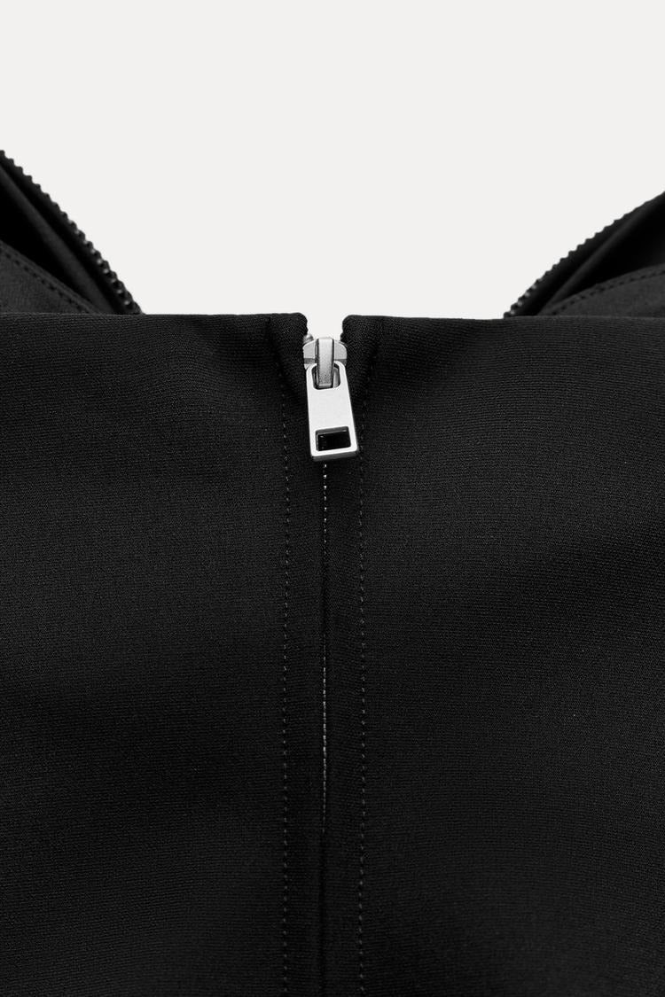 https://cdn.shopify.com/s/files/1/0998/9200/3147/files/White_Women_s_Crop_Top_with_Oversized_Bow_Detail__Lightweight_Sparkled_Cropped_T-Shirt_5.jpg?v=1766663477