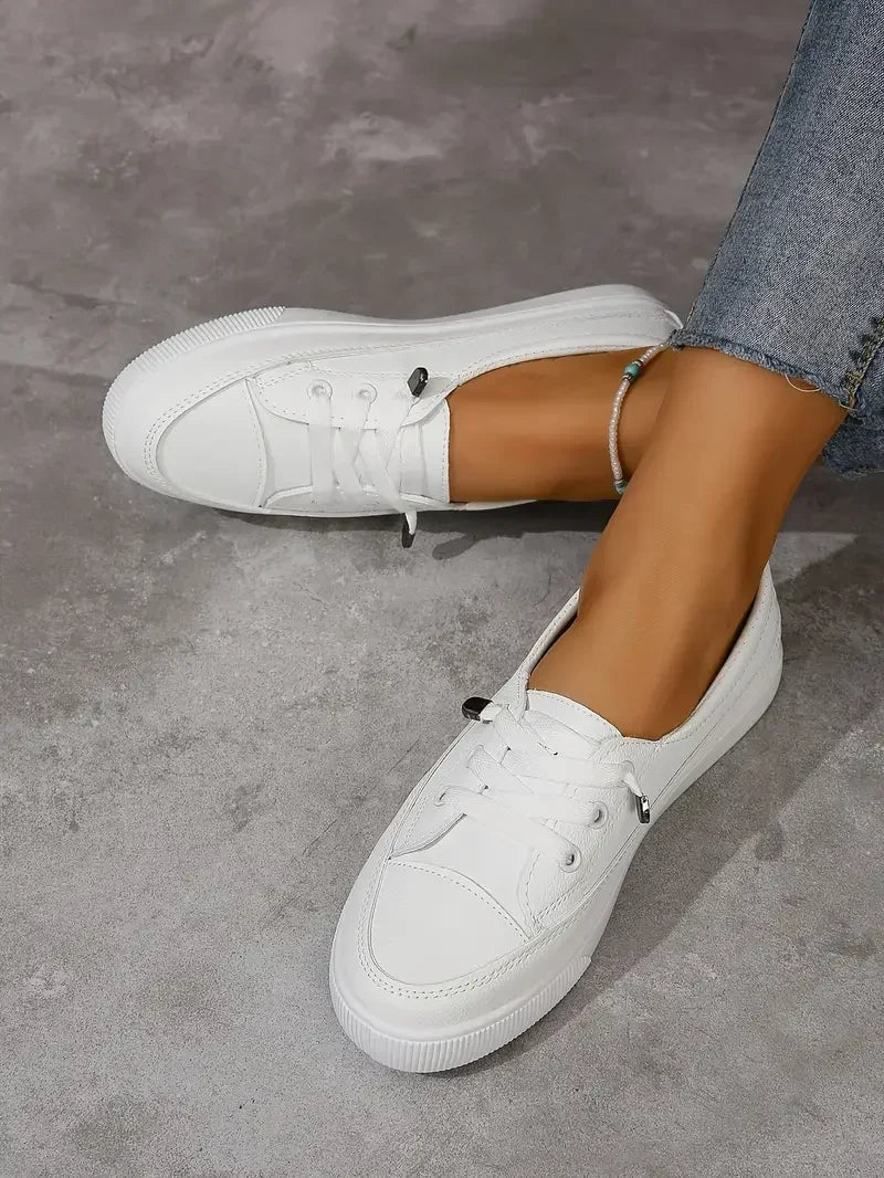 https://cdn.shopify.com/s/files/1/0998/9200/3147/files/Women_s_Casual_Round_Toe_Flat_Shoes_with_Lace-Up_Design_0.jpg?v=1766839656