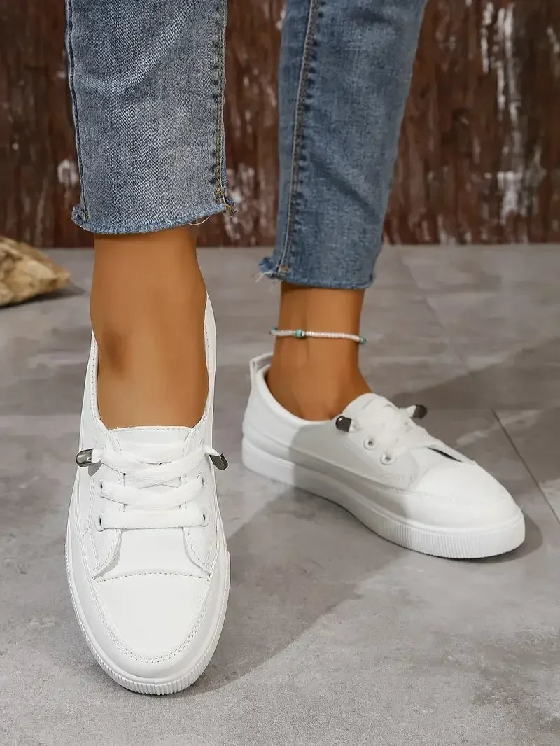 https://cdn.shopify.com/s/files/1/0998/9200/3147/files/Women_s_Casual_Round_Toe_Flat_Shoes_with_Lace-Up_Design_1.jpg?v=1766839656