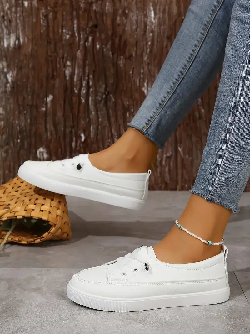 https://cdn.shopify.com/s/files/1/0998/9200/3147/files/Women_s_Casual_Round_Toe_Flat_Shoes_with_Lace-Up_Design_2.jpg?v=1766839656