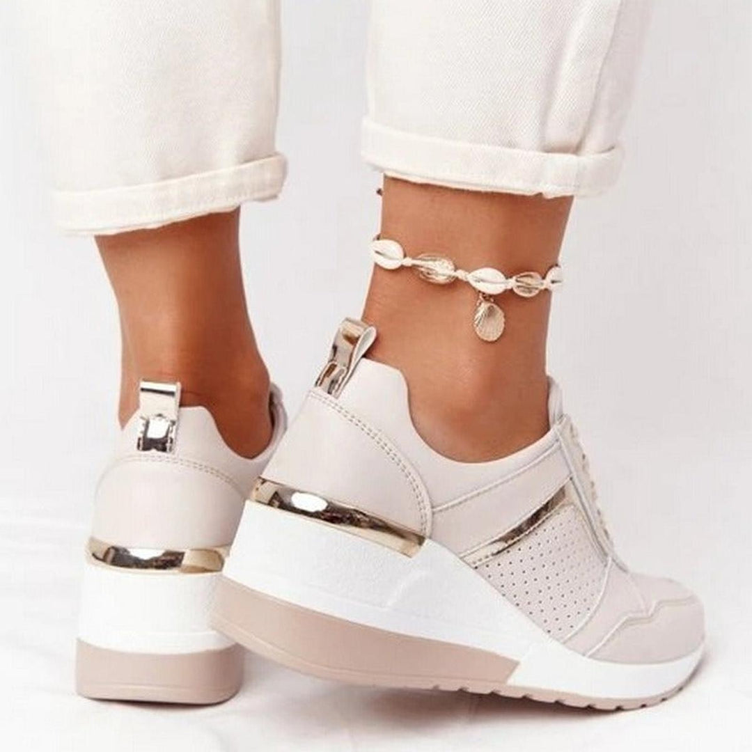 https://cdn.shopify.com/s/files/1/0998/9200/3147/files/Women_s_Orthopedic_Sneakers_For_Foot_Pain_Relief_1.jpg?v=1766839661