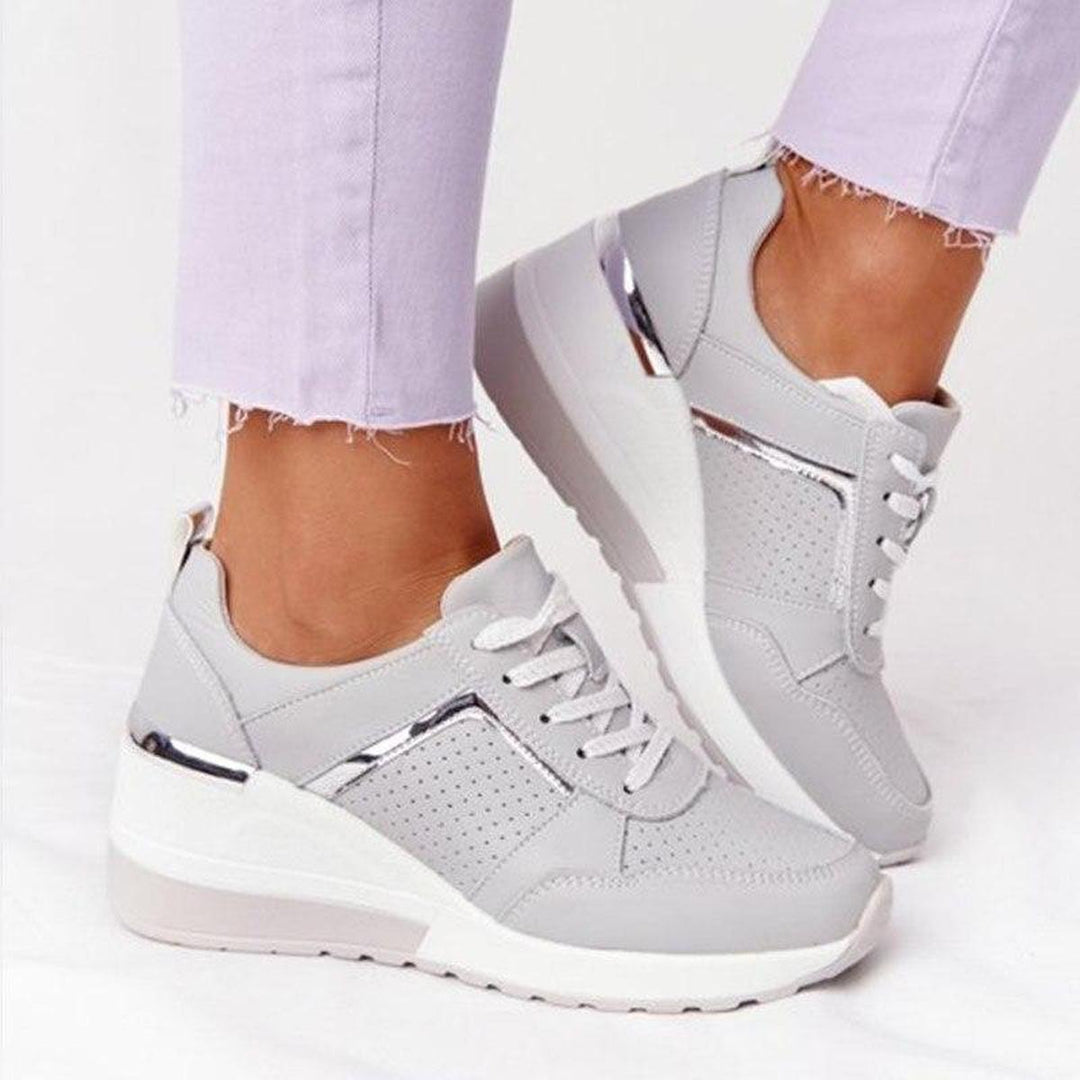 https://cdn.shopify.com/s/files/1/0998/9200/3147/files/Women_s_Orthopedic_Sneakers_For_Foot_Pain_Relief_2.jpg?v=1766839661