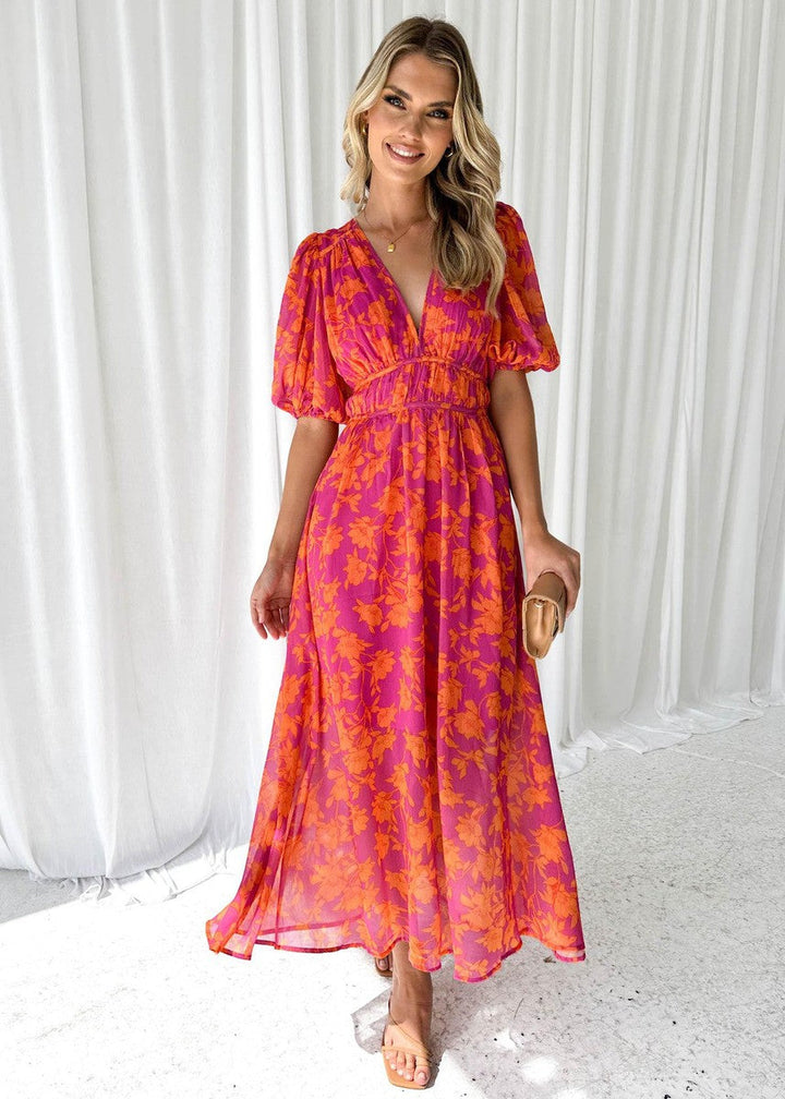https://cdn.shopify.com/s/files/1/0998/9200/3147/files/Women_s_Summer_Floral_Midi_Dress_with_Puff_Sleeves_and_V-neck_3.jpg?v=1766785418