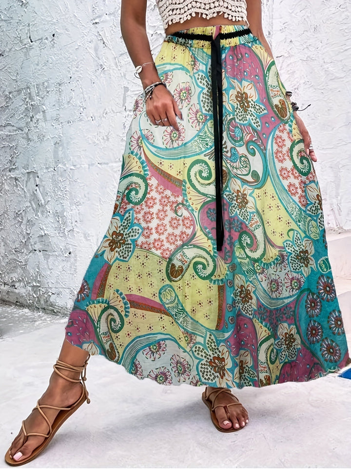 Summer maxi dressing gown with striking polka dots and an elegant bow for a fresh and stylish look.