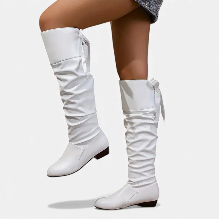 Bottes pour femme mi-mollet en cuir avec noeud et talon bas pour l'automne