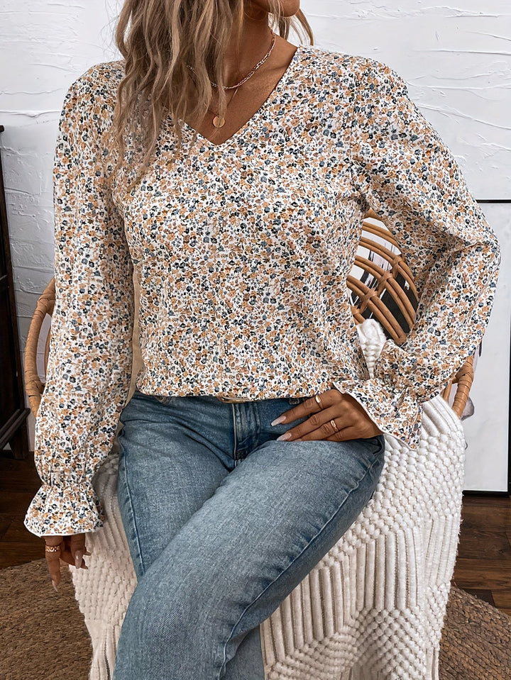 Eglantine | Chic Floral Print Blouse with V-Neck and Lace Bow Detail, Elegant Low Back Design